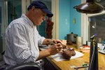 Stewart Wegner working on a wax casting.